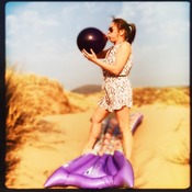 Big purple balloon at the beach-dunes