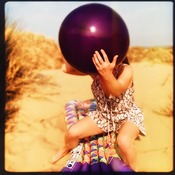 Big purple balloon at the beach-dunes