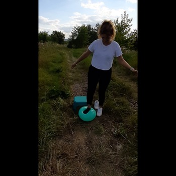 Hannah stomp pop 3 balloons in socks