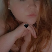 Girl showing her breasts