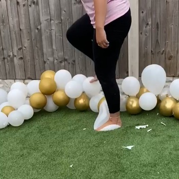 Freinds Mother popping balloon arch