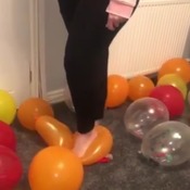 Hannah bursting balloons pt.1