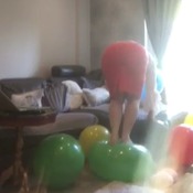Jodie bursting huge balloons