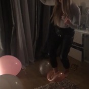 Sam bursting balloons loving it..