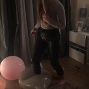 Sam bursting balloons loving it..