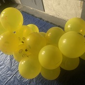 Mass pop smile balloons