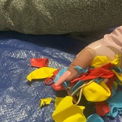 CUT BALLOONS WITH SCISSORS