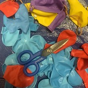 CUT BALLOONS WITH SCISSORS