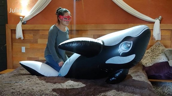 Deflating black intex whale