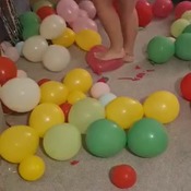 Hot mum bursting balloons