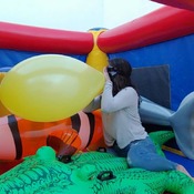 Ary pop balloons in a inflatable castle!!