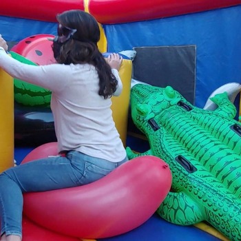 Ary pop balloons in a inflatable castle!!