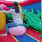 Ary pop balloons in a inflatable castle!!