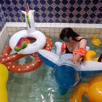 Deflating inflatables in the pool by Gin!!