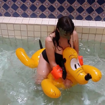 Riding and deflating inflatable pluto in the pool by Gin!!!