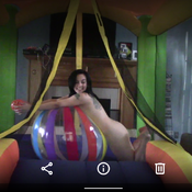Inflatable bouncy castle and a cupple of beach balls
