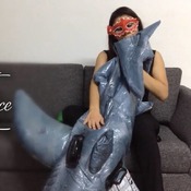 Blowing up inflatable shark by Alice