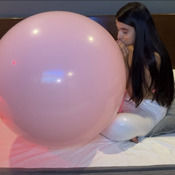 pink giant balloon, blow to pop