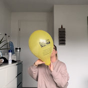Blow to pop two balloons