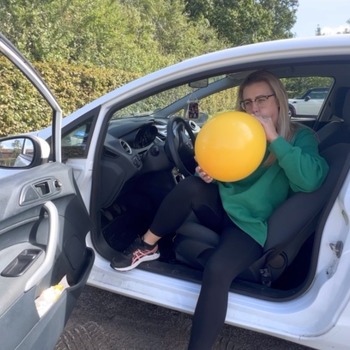 Big yellow tuftex balloon in the car