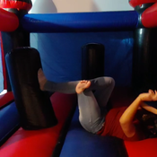 julie jumping on inflatable castle (spiderman)