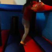 julie jumping on inflatable castle (spiderman)