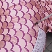 Daniela inflating and deflating mermaid tail float