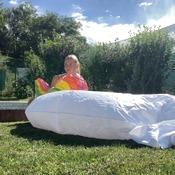 Danny inflating unicorn float to pool