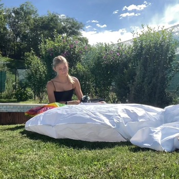 Danny inflating unicorn float to pool