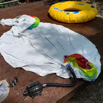 Inflating unicorn at the hot day