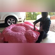 Mermaid inflating flamingo and other float