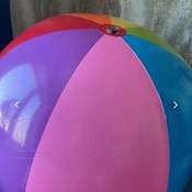 Valeria bouncing and deflating pink ball