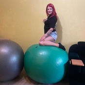 Valeria bouncing and deflating pink ball