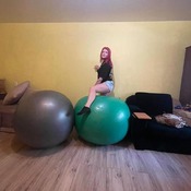 Valeria bouncing and deflating pink ball