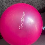 Valeria bouncing and deflating pink ball