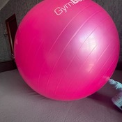 Valeria bouncing and deflating pink ball