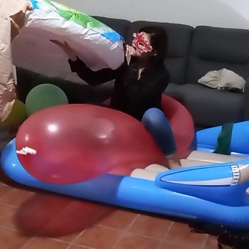 Alice blowing up a big round palette inflatable!!