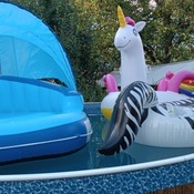 Inflating inflatable lounge island and unicorn