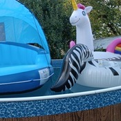 Inflating inflatable lounge island and unicorn