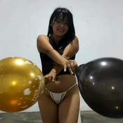 sexy girl sit to pop birthday balloons