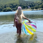 Vanessa and Darina shooting with beachball and other inflatables