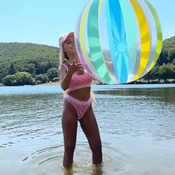 Vanessa and Darina shooting with beachball and other inflatables