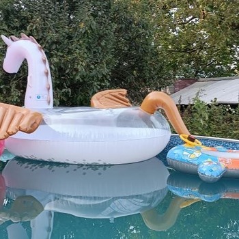 Inflating pool toy on the weekend