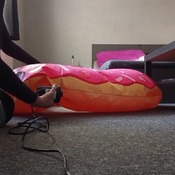 Lera inflating and deflating donut heart float.