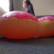 Lera inflating and deflating donut heart float.