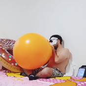 Blowing up 2 big unique 26 balloons