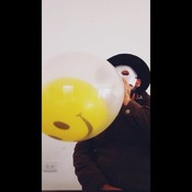 Blowing up happy balloons insite clear balloons!!