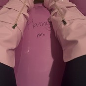 Sign and jump on the pink giant dog!