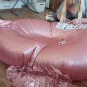 Nina inflating inflatables on the summer 2025