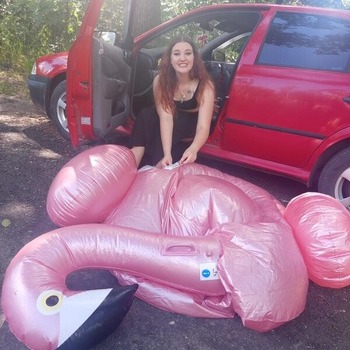 Lera and zuzana inflating and shooting with flamingo
